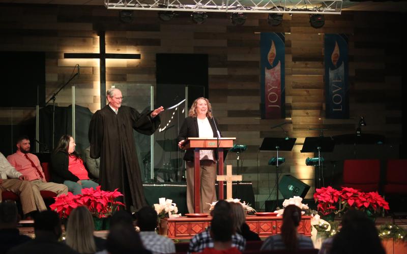 A recent graduate of the Northern Judicial Circuit's Felony Drug Court speaks at its commencement ceremony.