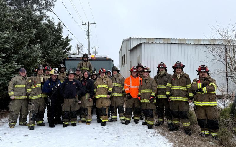 The Elberton and Elbert County fire departments pose for a picture after responding to a call during Winter Storm Fern. (Photo submitted by Crystal Ingram)