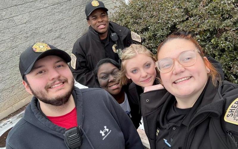 The essential staff of the Elbert County jail pose for a picture outside the jail. (Photo submitted by Tomeka Anderson)