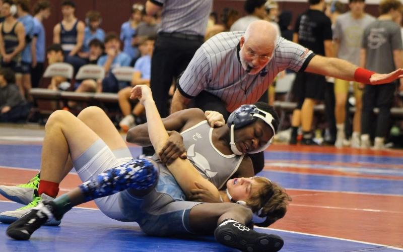 Bry Harper pins his opponent. (Photo courtesy of April Dixon Hughes)