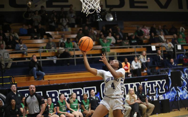 Kaylen Rucker (4) lays the ball up. (File photo by Bo Underwood)