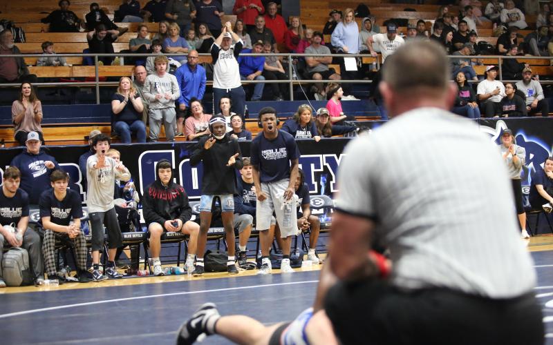 Jaylen Davis (left) and Jayden Thompson (right) cheer on a teammate from the Elbert bench. (File photo by Mark Wells)