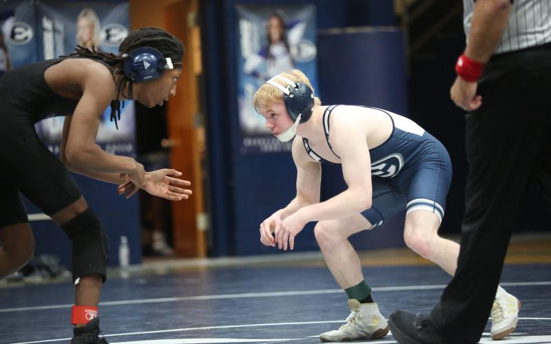 Cooper West prepares to wrestle his opponent. (File photo by Bo Underwood)