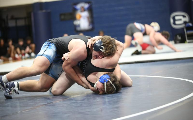 2026 215 lb. section champion Lincoln Blackmon corrals his opponent. (File photo by Mark Wells)