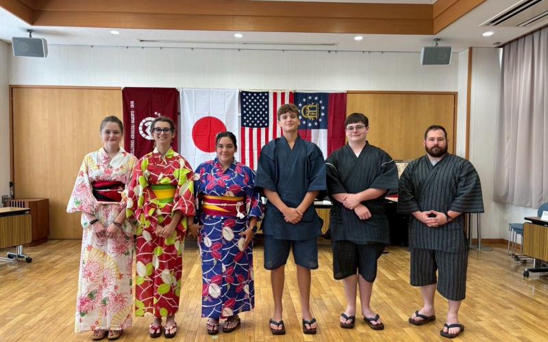 The 2025 group of sister city exchange students pose in traditional Japanese attire during their trip. (Photo by Megu Mi Ohta)