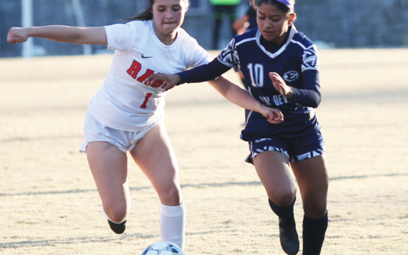 Kimberly Hernandez fights for the ball during a game against Rabun last season. (File photo by Mark Wells)