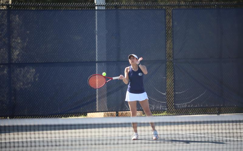 Emily Poon (first slide) and Gracie Kidd (second slide) played their final matches as Elbert County Lady Devils last Tuesday. (Photos by Bo Underwood)