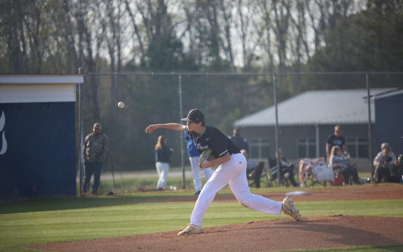 Brody Baker lets a pitch fly. (Photo by Bo Underwood)