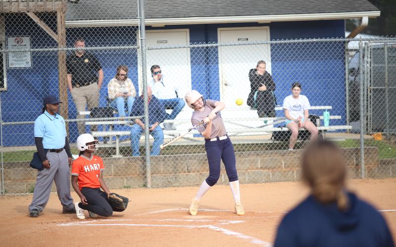 Audrey Lunsford hits the ball (Photo by Bo Underwood)