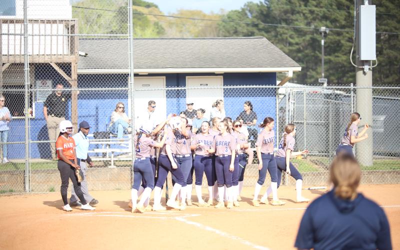 The Elbert County dugout celebrates a home run by Audrey Lunsford. (Photo by Bo Underwood)