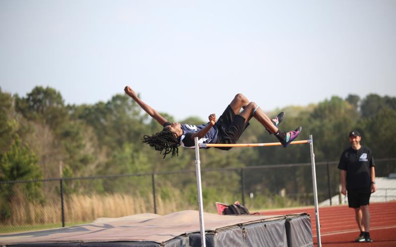 Jaylin Morrison takes off in the high jump. (Photo by Bo Underwood)