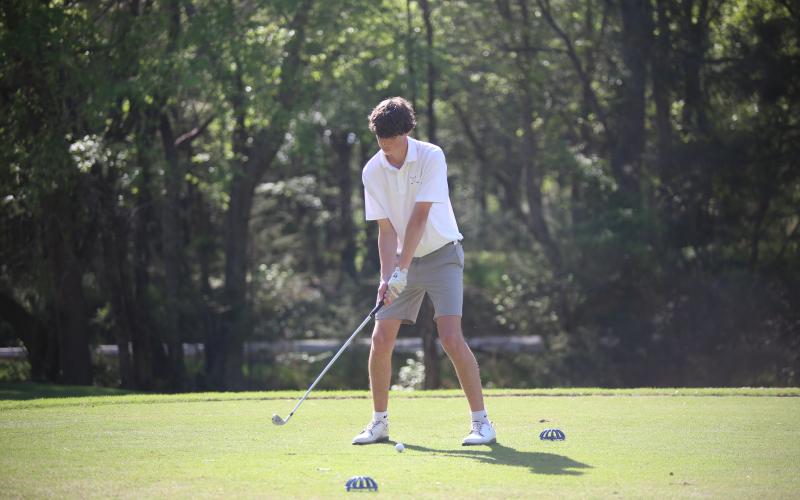 Maddox Adams hits the ball. (Photo by Bo Underwood)