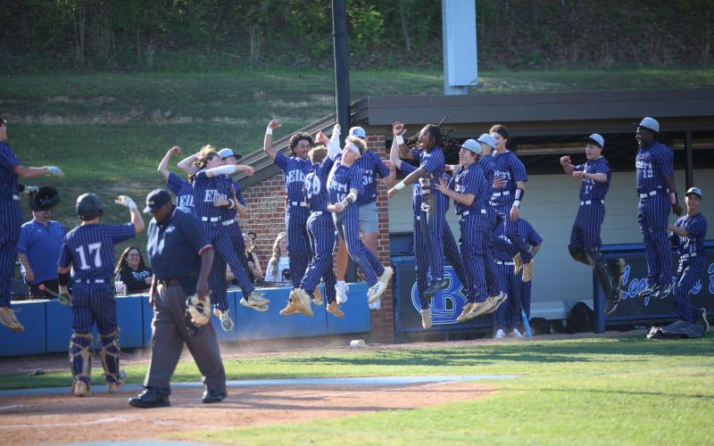 The Elbert County bench celebrates a home run in its win over Banks County on April 7. (Photo by Bo Underwood)