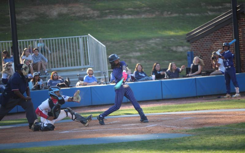 Cheyvis McLendon hits the ball in Elbert’s win over Banks County on April 7. (Photo by Bo Underwood)