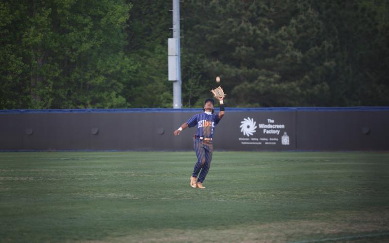 Jose Rodriguez catches a fly ball during Elbert’s sweep of Banks County. (Photo by Bo Underwood)