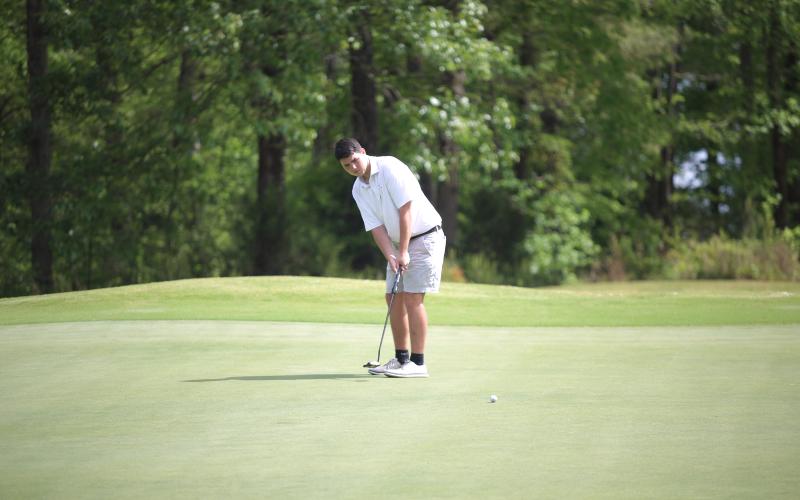 Nolan Henderson putts the ball at the 2026 Granite City Classic on Monday, April 13. The Elbert County boys’ golf team finished second overall at the 18-hole tournament at Arrowhead Pointe. (Photo by Bo Underwood)