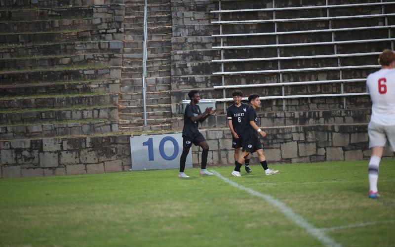 Judeson Lexima (11) and Andres Paita (6) celebrate a goal. (Photo by Bo Underwood)