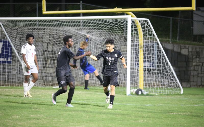 Pablo Medellin (right) and Judeson Lexima (right) celebrate a goal. (Photo by Bo Underwood)