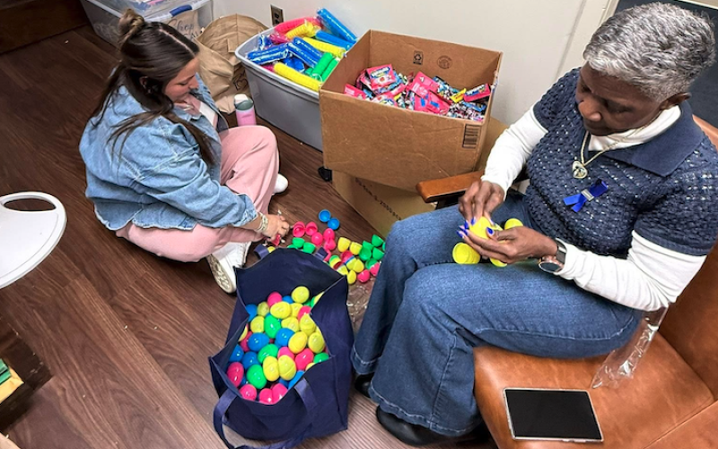 Katie Slay and Pam Allen help to pack eggs in preparation of the Eggstravaganza. (Photo by Crystal Beebe)