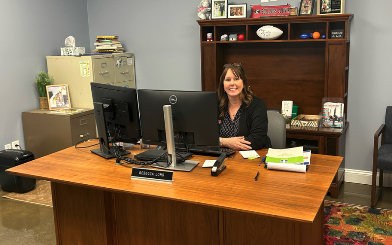 Rebecca Long sits at her desk in the UGA Extension office. (Photo by Bo Underwood)