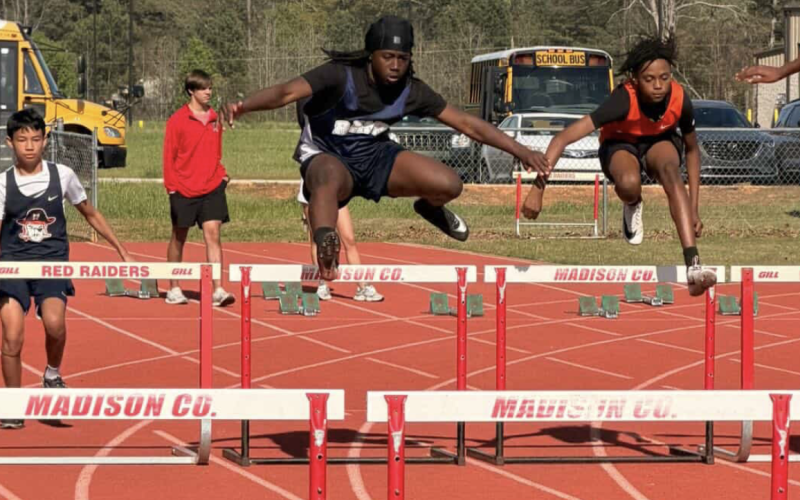 Elbert County’s Kaison Huff jumps over a hurdle. (Photo courtesy of Tyson Cade)