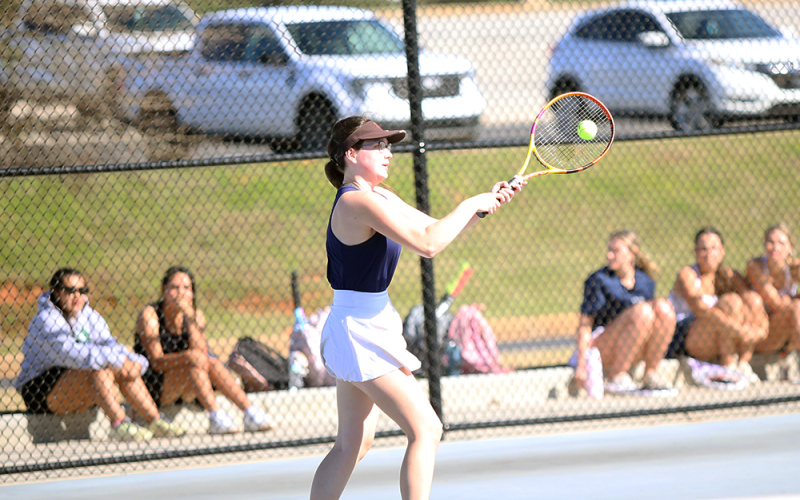 Emily Poon (first slide) and Gracie Kidd (second slide) played their final matches as Elbert County Lady Devils last Tuesday. (Photos by Bo Underwood)