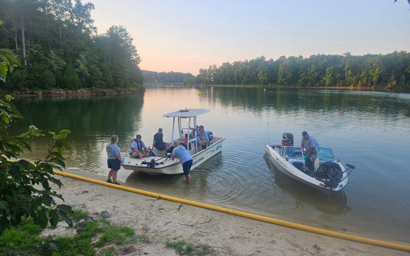 Elbert County EMS Assistant Director Beth Seymour (far left) and the Elbert County dive team put their boat in the water on Lake Richard B. Russell. (Photo courtesy of Justin Hobbs)
