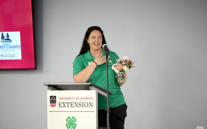 Elbert County 4-H agent Lauren Dye speaks to attendees of the ribbon cutting ceremony. (Photo by Bo Underwood)