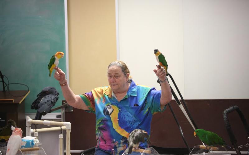 Brenda Bean came to the Elbert County Public Library Friday to give children and parents an educational presentation on tropical birds. (Photo by Bo Underwood)