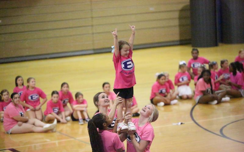 Scenes from the parent performance on the final day of the Elbert County youth cheerleading camp June 24. (Photos by Bo Undewood)