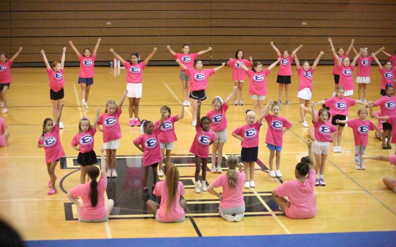 Scenes from the parent performance on the final day of the Elbert County youth cheerleading camp June 24. (Photos by Bo Undewood)