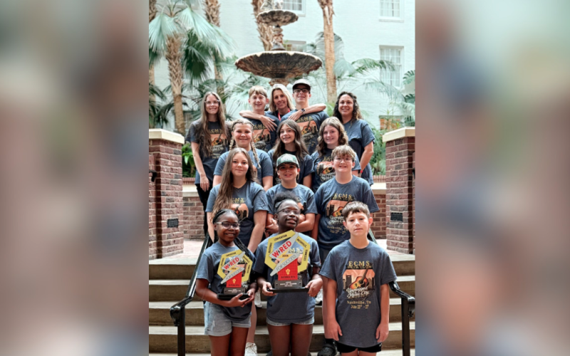 The Beta Club poses with their two awards from the National Junior Beta Convention. Pictured are (front row, L-R) Myla Hood, Alyssa Handy, Michael Evans, (second row, L-R) Claire Moon, Klay Hall, Landon Hulme, (third row, L-R) Reece Oakley, Sophie Black, Lizzy Sigman and (fourth row, L-R) Brooke Bowen, Monroe Ray, Marie Roach, Kale Hall and Megan Ray. (Photo courtesy of Marie Roach)