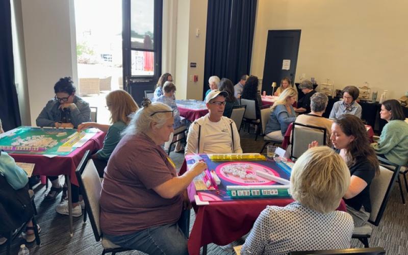 A group of Mah Jongg players compete against each other and socialize during an introductory class at the Elbert County Public Library. (Photo courtesy of Amy Campbell)
