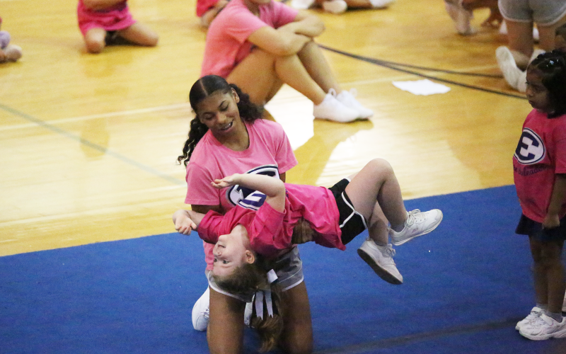 Scenes from the parent performance on the final day of the Elbert County youth cheerleading camp June 24. (Photos by Bo Undewood)