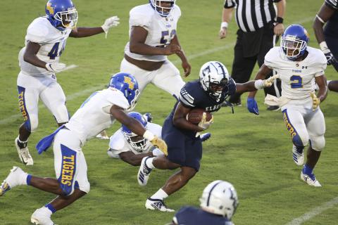 Blue Devil senior running back Shun Allen alludes Tiger defenders on his way to a 134-yard, two-touchdown performance during Elbert County’s 28-14 victory over Washington-Wilkes Aug. 30 in Elberton. (Photo by Dan Giles)