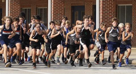 Rams runners (L-R) Mason Dove, Aiden Belli, Kale Kurtz, Brayden Ingram, Eli Harris, Sam Gailey, Madden Drake take off from the starting line in the first Elbert County Middle School Cross County meet Sept. 10. (Photo by Cary Best)