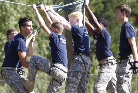 Elbert County JROTC Male Raiders team members (L-R) Logan Vickery, Briley Jenkins, Grady Thomas, Jordan Teasley, D.J. Veal and Nicholas Smith compete in the rope bridge event during a meet at Jackson County High School Sept. 21 in Jefferson. (Photo by Cary Best) 