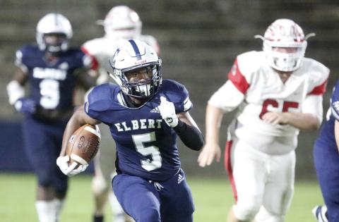 Blue Devil junior running back C.J. Tate rushes for an 80-yard touchdown during Elbert County’s 56-7 region win over Social Circle Friday night Sept. 27 in the Granite Bowl in Elberton (Photo by Cary Best).