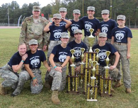 Elbert County Mixed JROTC team members (front, L-R) Haylee Marunich, Jamitel Bernier, Maelynn Ruff, Mathew Hernandez, Justin Bastyr; (back) Sgt.  Cadd, Marilynn Flores, Brandon Nestor, Gabriel Pless, Dean Blanchard, Thomas Vaughn and Makayla Ingle pose with the 2019 Mixed Team Raiders State Championship Oct 26 at Griffin High School. (Photo special to The Star)