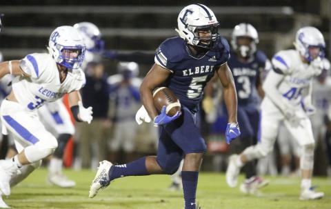Blue Devil junior linebacker C.J. Tate returns a fumble 40 yards for a touchdown during Elbert County’s 48-7 region win over Banks County Nov. 8 in the Granite Bowl. (Photo by Cary Best)