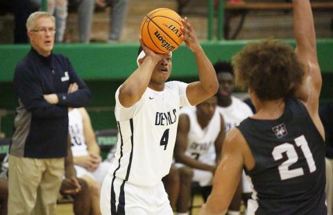 Blue Devil senior shooting guard D.J. Ardister shoots one of his four 3-pointers as coach Don Hurlburt looks on during Elbert County’s 76-60 win over Westside of Anderson, South Carolina Nov. 23 at Franklin County High School in Carnesville. (Photo by Cary Best)