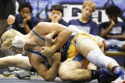 Mat Devil senior Brice Noggle pins Apalachee senior Brandon Bryant as his teammates (L-R) Trez White, Camden Harris, Nolan Johnson and Tyshawn Hughes look on during the Granite City Scramble Nov. 23 in the Inferno. (Photo by Cary Best)