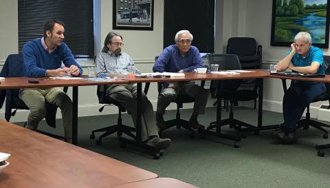Elbert Memorial Hospital Authority Board members (L-R) Daniel Graves (chair), Max Black, Dr. Glenn Poon and Tom Steele talk at Friday’s meeting of the authority. (Photo by Jones).
