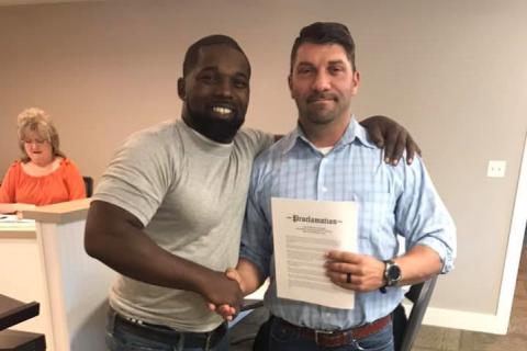 File photo of Pete Gibbons (right) with Mecole Hardman Sr. 