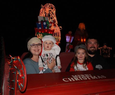 The Lunsfords – (L-R) Brittney, Charlie, Stella and Kyle – begin decorating two months ahead of Thanksgiving to open the family’s farm light display in Bowman. (Photos by Scoggins)