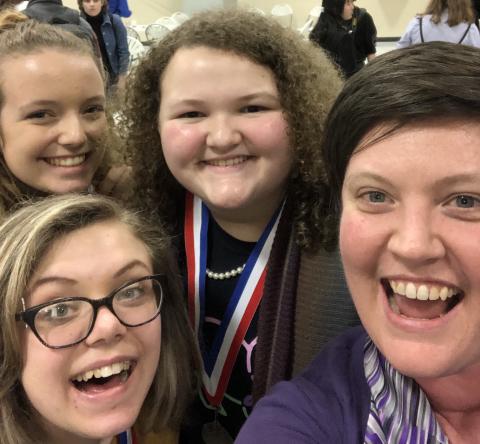 Shown are (L-R) Abigail Rushing, Lana Sherman and Emma Williams along with ECMS, ECCHS Choral Director Allyson Dye.