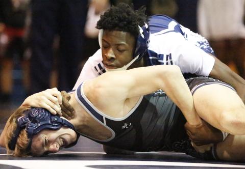 Mat Devil junior Jamal Rucker (top) defeated East Jackson’s Ryan Sparks by pin in the second round of 126-pound division of the Inferno Invitational Jan. 25 in Elberton. (Photo by Cary Best)