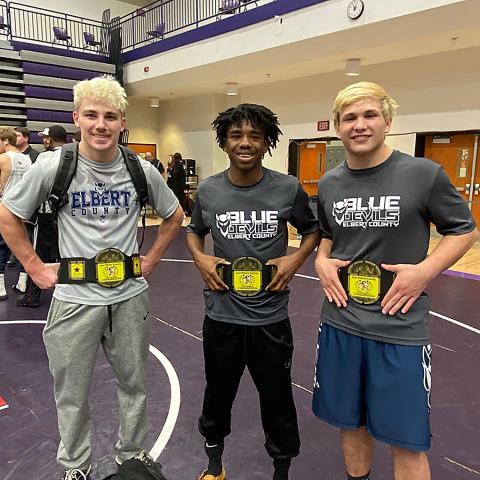 Mat Devils (L-R) Gavin Brady, Tyshawn Hughes and Brice Noggle each won their weight class during the East Metro Invitational Jan. 4 at Monroe Area High School. (Photo courtesy of Blue Devil Wrestling) 