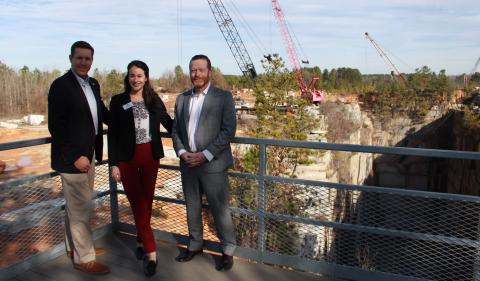 EGA Executive Vice President Chris Kubas, Elbert County Chamber of Commerce President Leslie Friedman and BOC Chairman Lee Vaughn stand on the viewing platform over Pyramid Quarry on Monday, Feb. 3.
