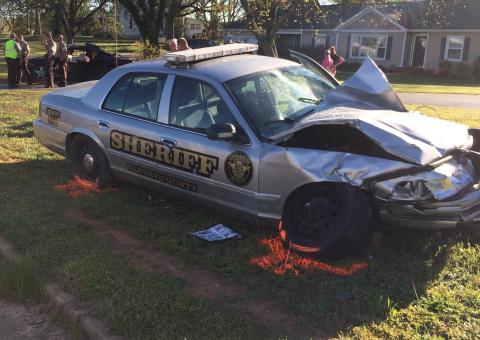 An Elbert County woman, Heather Ratliff Payton, 31, was killed during this accident involving an Elbert County Sheriff’s vehicle (foreground) in April of 2017. Payton’s vehicle, in the background, rotated counter-clockwise 180 degrees after impact and she was thrown from the vehicle, according to a report of the accident released by the Georgia State Patrol. (Photo by Jones)